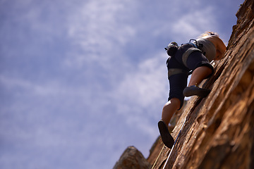 Image showing Woman, rock climbing and workout for adventure, fitness and exercise in outdoors for extreme sports. Female person, mockup and nature for wellness, mountain and fearless activity for strength