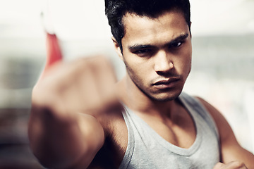 Image showing Man, portrait and boxing with confidence, fight and fists ready to punch in match for training and exercise. Male person, workout and cardio in gym, mma and boxer for sports and combat in vest