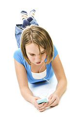 Image showing Teenage girl listening to music