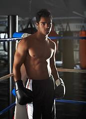 Image showing Male boxing athlete, gym and portrait for fitness, exercise and wellness in strong training for confidence to fight. Man, sport and boxer in workout, challenge and shirtless ready to punch for mma