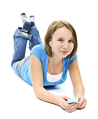 Image showing Teenage girl listening to music