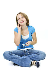 Image showing Teenage girl listening to music