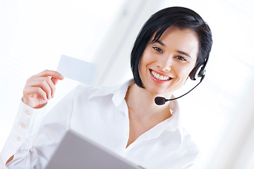 Image showing Portrait, headset and call centre with business card, office and sales for online crm. Female agent, mockup or consultant for advice, help or B2B customer support with technology or telemarketing