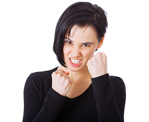 Image showing Woman, portrait and angry in studio with fist for fighting, frustrated and stress with rage. Female person, upset and emotion with annoyed expression, moody and mad isolated with white background