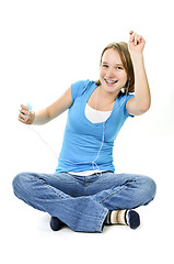 Image showing Teenage girl listening to music