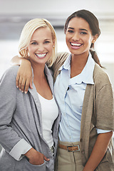 Image showing Portrait, woman and coworker with work in hug, happiness, and collaboration for friendly and positive teamwork. Office, employee and smile with joy for professional, support and care together.