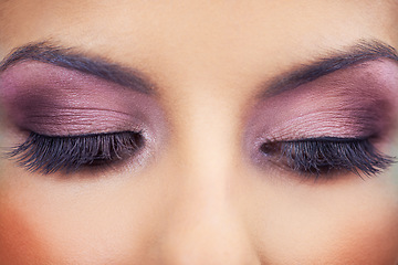 Image showing Closeup, beauty and eyeshadow for cosmetic, lashes and mascara for model and microblading. Woman, glamour and eyes with highlights, makeup and colour with extensions for bold and eyeliner face