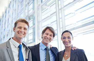 Image showing Business people, workspace and smile for diversity, portrait and company with office for corporate. Management, employee and teamwork for collaboration, trust and union for career or mentorship