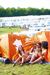 Image showing Happy, friends and laughing in tent at funny festival for joke, comedy or humor at outdoor campsite. Friendship, young group or people enjoying fun holiday weekend, event or camping on grass at party