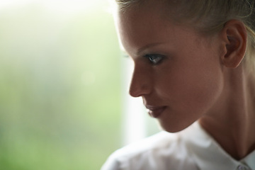 Image showing Thinking, window and face of woman with memory, reflection and planning expression by mockup. Brainstorming, ideas and closeup of young female person with wonder at apartment with mock up space.