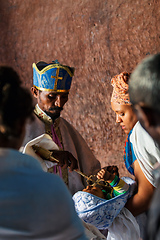 Image showing Orthodox Christian baptism ceremony at St. George Church captures a sacred moment in Ethiopian spiritual life.