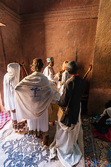 Image showing Orthodox Christian baptism ceremony at St. George Church captures a sacred moment in Ethiopian spiritual life.