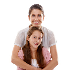 Image showing Happy mother, portrait and hug with child for family, support or love in bonding on a white studio background. Mom, daughter or kid with smile for embrace, trust or parenting in protection or safety