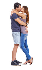 Image showing Hug, love and couple kiss in studio for care, romance or commitment to marriage isolated on a white background. Man, woman and touch lips to embrace for connection, support and relationship on mockup