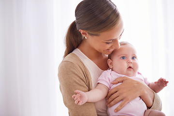 Image showing Mother, hug and baby with love, support and care for family, bonding and maternity at home. Happy mom, parent or woman playing with her newborn child or infant for development, excited and growth