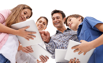 Image showing happy, family and children with tablet on a white background for internet, website or online games. Family, below and mom, dad and kids on digital tech for streaming, connection and videos in studio