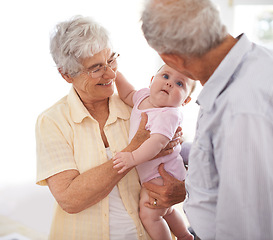 Image showing Grandparents, baby and family for love and bonding, happy old people at home and connect with infant for relationship. Pride, positive and care with retirement and newborn for joy and fun together