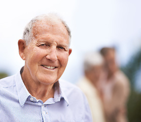 Image showing Senior, man and happy portrait outdoor on holiday, vacation and travel for retirement with confidence. Elderly, person and face with smile in garden, nature or backyard of home for relax and break