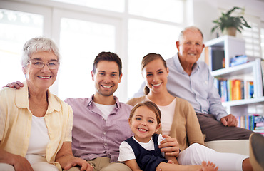 Image showing Portrait, big family and happy child on sofa in home for bonding, love or kid relax together with parents. Face, grandparents and girl with mother and father in living room with smile for connection
