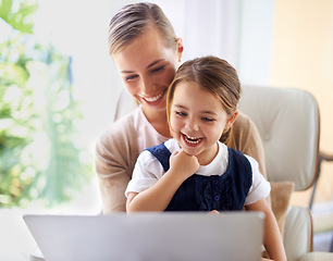 Image showing Laptop, school or elearning with mother and daughter on sofa in living room of home to study together. Education, remote class or homework with woman parent and girl child in apartment for growth