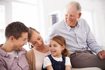 Image showing Parents, grandfather and child with happiness on sofa for healthy development, security or comfort in apartment. Family, men and woman with girl kid, smile and bonding for parenting and love in house