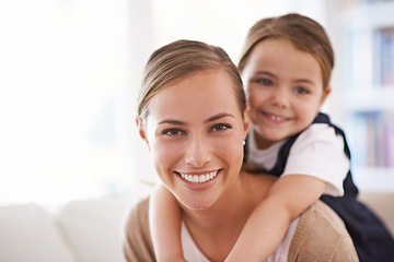 Image showing Mother, child and piggyback in portrait with games in family home, love and bonding with smile while playing. Playful woman, young girl and happy in living room with fun time together for childhood