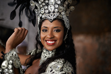 Image showing Portrait, woman or dancer to smile for carnival, costume and jewelry with sparkle, bling or diamante. Black female person, red lipstick and dancing with energy, action and movement in Rio de Janeiro