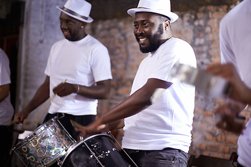 Image showing Carnival, drummer and music with band in Brazil for entertainment, festival or performance event. Smile, concert and black man playing drums in Rio de Janeiro for culture, heritage or tradition