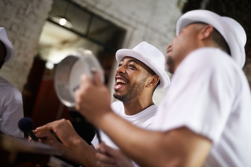 Image showing Excited man, band and percussion with music at night for performance, singing or musical event. Happy person or group of musicians playing instruments for sound or fun local entertainment at concert