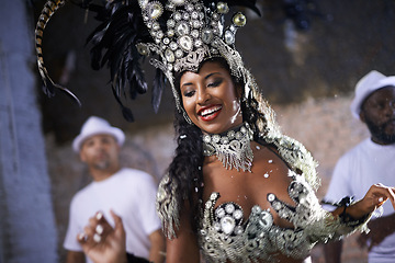 Image showing Carnival, samba and woman as dancer in Rio de Janeiro, joy and performance for crowd with energy. Female person, artist and clothes from feather for fashion with culture, music and celebration