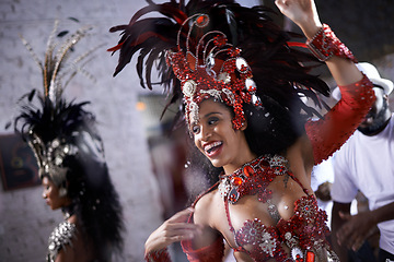 Image showing Happy, dancer and samba for carnival and music festival or night performance with costume and band. Woman, dancing and drums for event, celebration and culture or history in Rio de Janeiro, Brazil