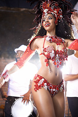 Image showing Black woman, dancing and samba with band at night for carnival season celebration in Rio de janeiro with sequins costumes. Female person, happy and fun at festival with unique fashion for culture