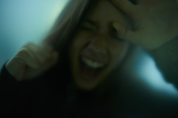 Image showing Scary, scream and woman with hand on glass, window or person trapped in home. Girl, shadow and figure in horror, drama or creepy aesthetic with angry shouting from terror in house with fog on screen