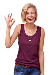 Image showing Happy woman, portrait and good job with ok emoji for well done or perfection on a white studio background. Female person, blonde or model with smile, like or yes sign for spot on, correct or precise