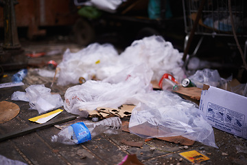 Image showing City, pollution and garbage or trash on street, landfill and junkyard or destruction of climate. Outdoors, waste and ecological disaster or global problem, disposal and environment of dirt in town