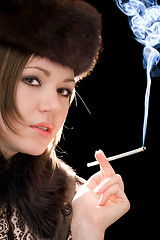 Image showing Portrait of the young woman with a cigarette