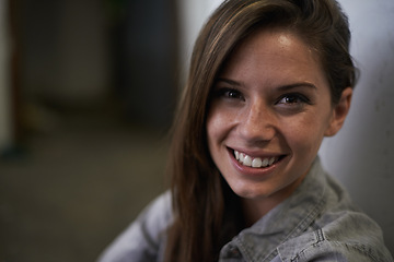 Image showing Positive, female person and happy portrait of student, casual and hopeful girl against wall. Brazil, woman and dark background in home, feeling joy and stress free, confident and proud smile