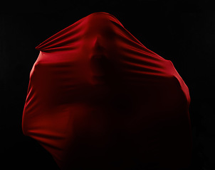 Image showing Person, transparent fabric and silhouette of face screaming in horror, fear and trapped isolated on a black background. Ghost, red cloth and outline of human yelling in terror, surreal or scared