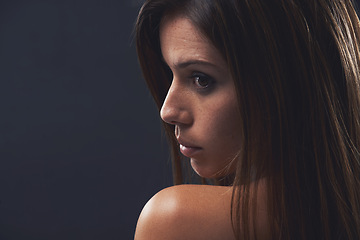 Image showing Woman, facial treatment and beauty in studio, cosmetics and promotion of skincare on black background. Female person, mockup space and profile for dermatology, confidence and pride for glowing skin