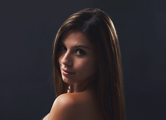 Image showing Woman, haircare and beauty for portrait in studio, cosmetics and satisfaction for keratin treatment on black background. Female person, transformation and pride for dermatology, confidence and gloss