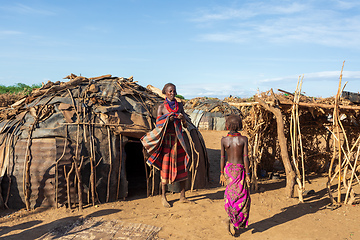 Image showing Dasanesh woman in traditional African village, Omorate, Omo Valley, Ethiopia