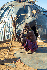 Image showing Dasanesh woman in traditional African village, Omorate, Omo Valley, Ethiopia