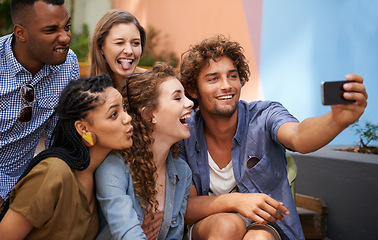 Image showing Crazy, face and group of friends for selfie at university campus for profile picture update or social media post. Men, women and happy students with technology for memory, diversity and college fun