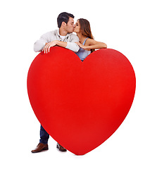 Image showing Couple, kiss and heart paper in studio for romance, love and care with affection and mockup on a white background. Young woman and man with red poster, shape and marketing space for valentines day