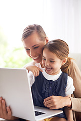 Image showing Laptop, education or laughing with mother and daughter on sofa in living room of home to study together. School, remote elearning or funny with woman parent and girl child in apartment for growth