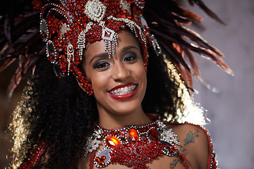 Image showing Carnival, dance and woman in portrait for performance in Brazil, dancer with gemstone outfit and feather head gear outdoor. Music, samba and happiness for event and culture with festival and talent