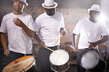 Image showing Man, drums and group band playing with instrument at festival, carnival or night party with lens flare. Male person, talented drummer or young musicians at concert for music performance and audition