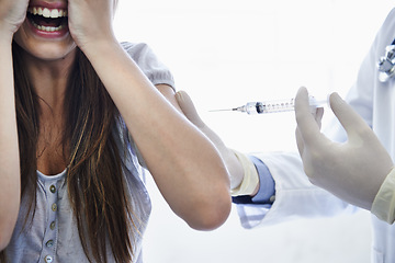 Image showing Patient, doctor and syringe injection with fear, scream or needle for flu vaccination, trypanophobia or healthcare. Medical worker, woman and shot in arm for disease protection, scared or treatment