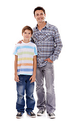 Image showing Happy father, portrait and hug with child in fashion for family bonding on a white studio background. Dad, son or kid with smile in casual clothing, support or or trust for parenthood or childhood