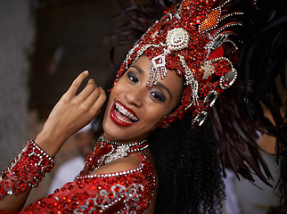 Image showing Carnival, dance and woman in portrait for event in Brazil, dancer with gemstone outfit and feather head gear outdoor. Music, samba and happiness for performance and culture with festival and talent
